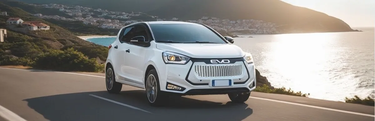 MG3 Híbrido blanco circulando por carretera costera con vistas al mar