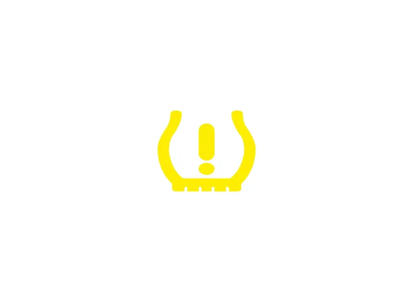 Testigo luminoso amarillo de presión de neumáticos en el tablero del coche