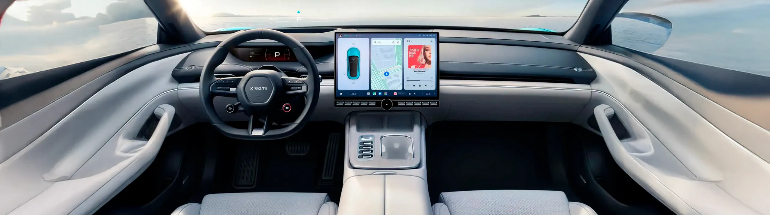 Interior del Xiaomi SU7 con pantalla táctil, volante y tecnología avanzada